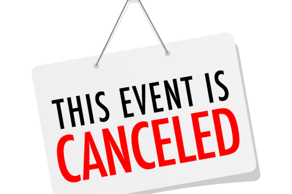 A window sign that says "This Event is Canceled"
